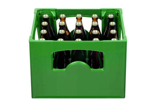 Beer bottles in crate Beer bottles in crate with fictive bottle cap beer crate stock pictures, royalty-free photos & images