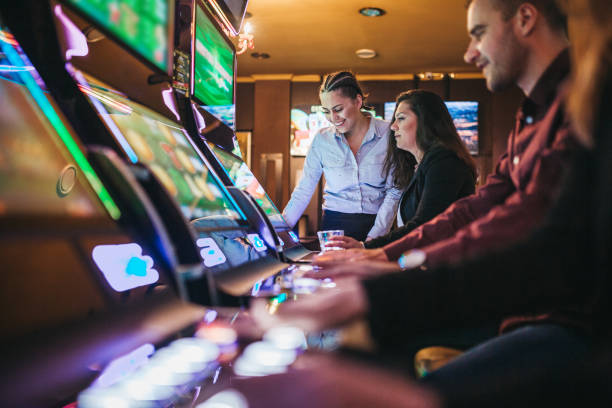 istock People gambling on slot machines 1310347839