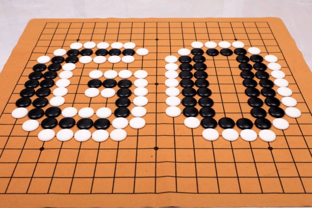 istock chinese game go,  Gobang and go game board 1310348730