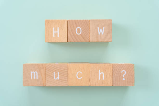 istock How much?; Eight wooden blocks with 