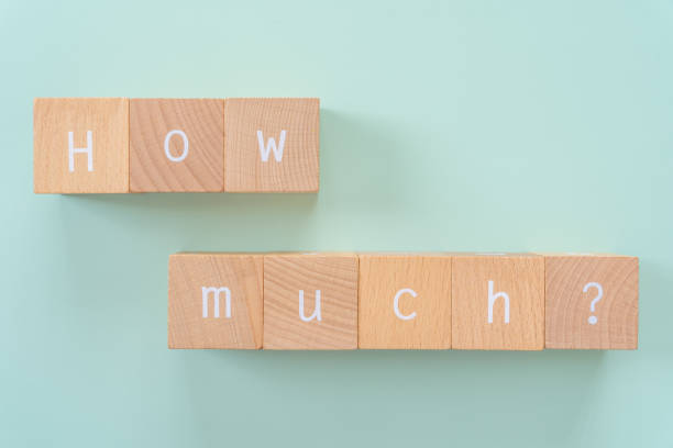 istock How much?; Eight wooden blocks with 