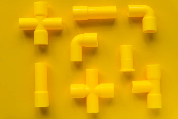 istock Kids toy yellow pipe on yellow background 1310350311