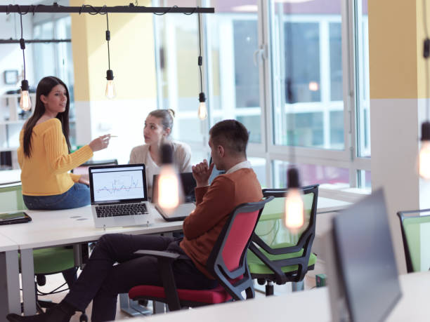 istock creative business people group as freelancers in modern coworking open space office 1310351632