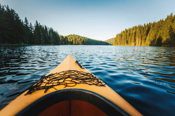 istock Kayak boat near a lake at sunset. 1310352430