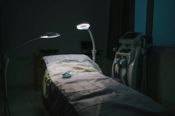 istock beauty clinic Cosmetologist operating room illuminated with 2 LED light 1310352480