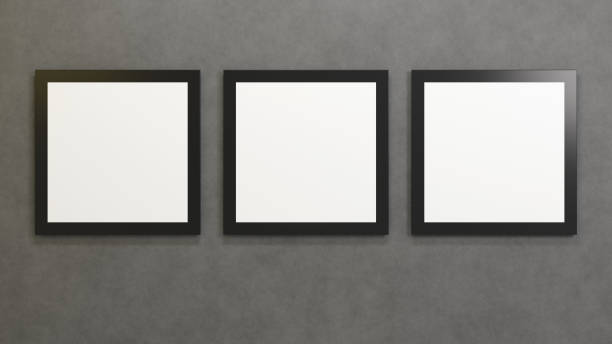 istock Three square pictures hanging on gray concrete wall. Template of posters with a black frame. 3D rendering mockup. 1310354362