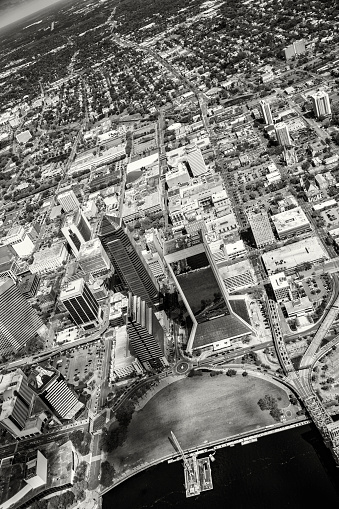 Black and white abstract view of the downtown section of Jacksonville, Florida from high overhead during a helicopter photo flight.