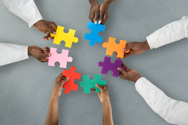 istock African Medical Doctors Holding Puzzle Together 1310357952