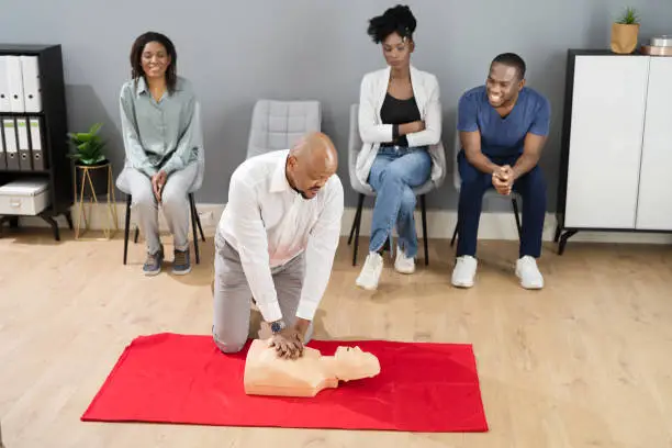 CPR First Aid Lifeguard Or Paramedic Class With African Students