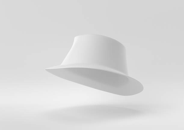 istock White Fedora Hat floating in white background. minimal concept idea creative. monochrome. 3D render. 1310374235