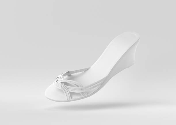 istock White shoe floating in white background. minimal concept idea creative. 3D render. 1310374241