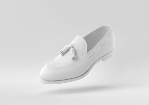 istock White shoe in white background. minimal concept idea creative. 3D render. 1310374242