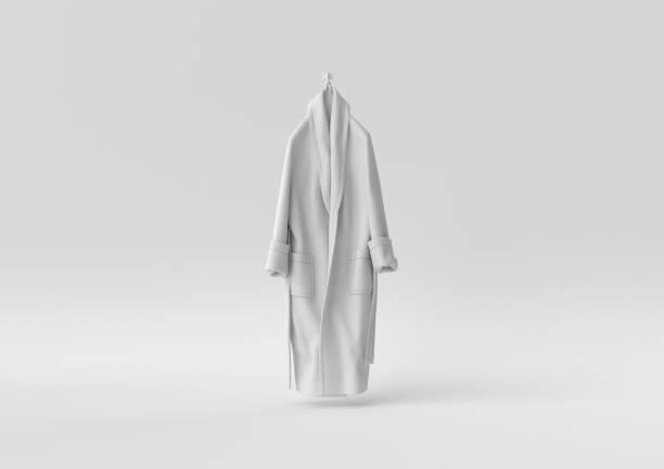 istock White Bathrobe in white background. minimal concept idea creative. monochrome. 3D render. 1310374263