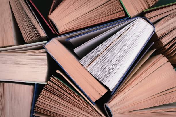 istock Background from the pages of old half-open books. 1310374479