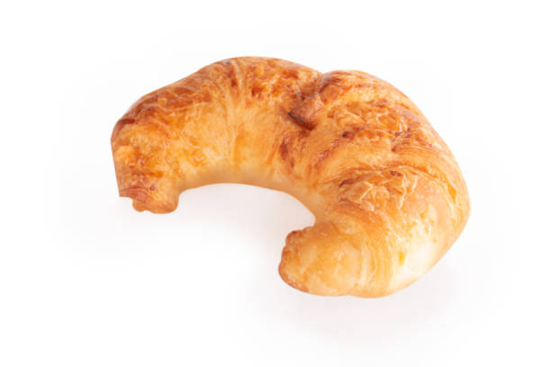 istock Fresh croissants isolated on white background 1310376692