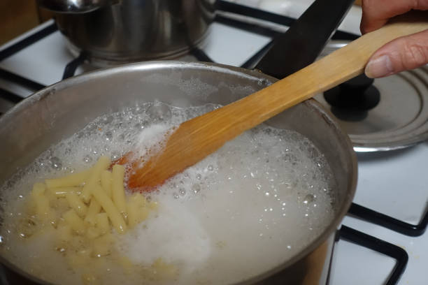 istock Cooking cannelloni pasta in boiling water 1310377490