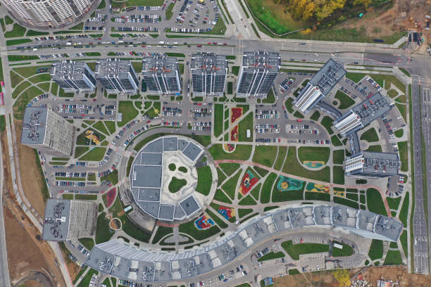 istock Photo from drone flying over multistorey buildings top view 1310385557