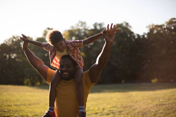 istock African American father and son in nature. 1310385576
