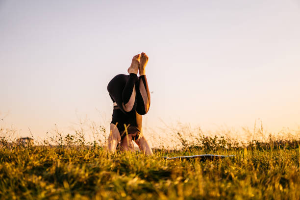 istock Pretty woman doing yoga exercises 1310386742