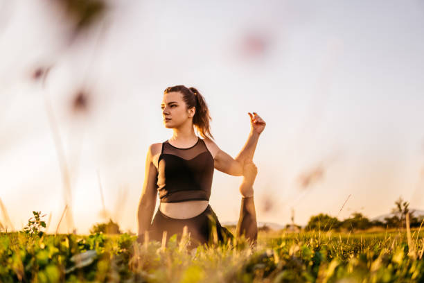 istock Pretty woman doing yoga exercises 1310387400