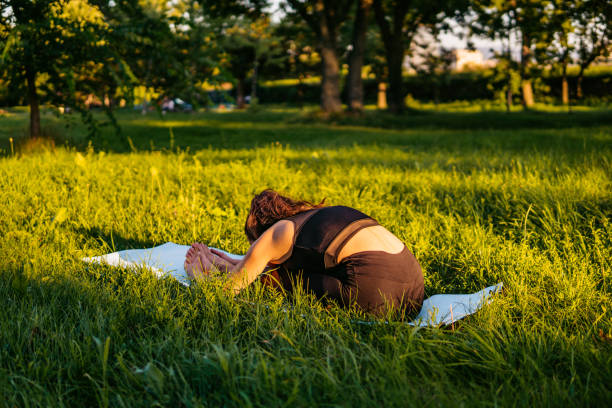 istock Pretty woman doing yoga exercises 1310387417
