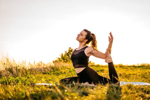 istock Pretty woman doing yoga exercises 1310387451