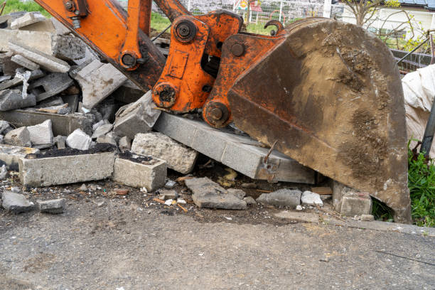 istock Work on the excavator in the field 1310387459