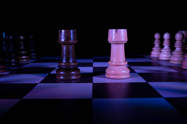 istock Rook, chess figures on a chessboard. Dark background 1310389619