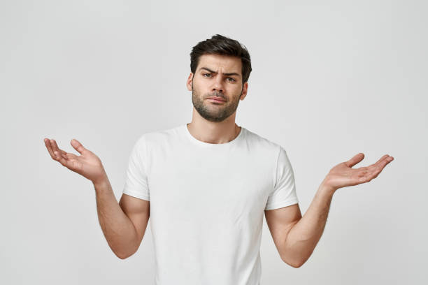 istock Young bearded man spreading his arms to the side 1310390281