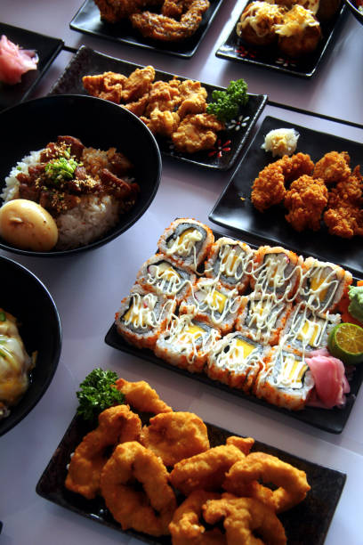 istock Freshly made assorted Japanese food on a table 1310390709
