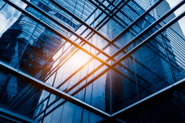 istock Modern office building from below Skyscrapers in a finance district 1310390818
