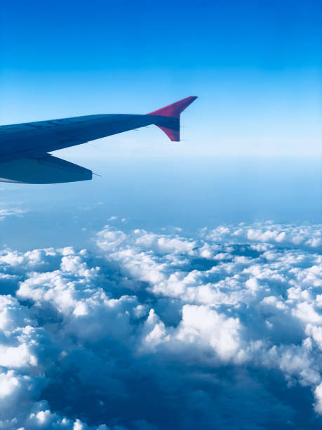 istock View through a passenger airplane window on a beautiful landscape. 1310392976