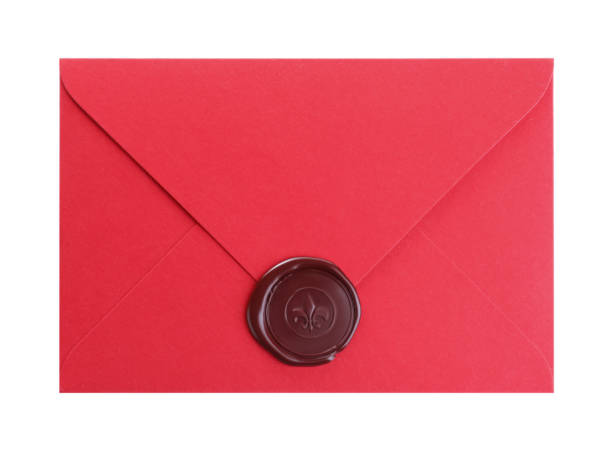 istock Red envelope with wax seal isolated on white, top view 1310394311