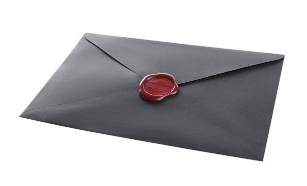 istock Black envelope with wax seal isolated on white 1310394517