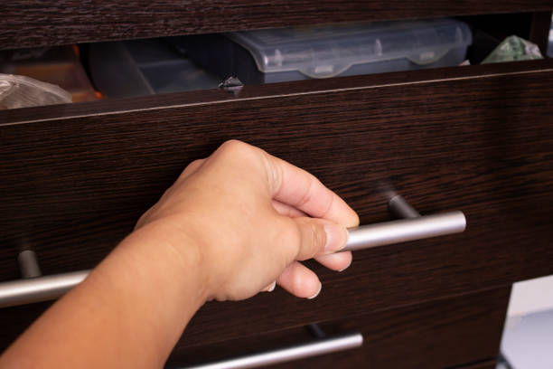 istock Open drawer of wooden table close up 1310395964