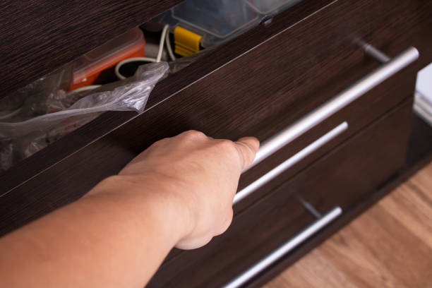 istock Open drawer of wooden table close up 1310396359