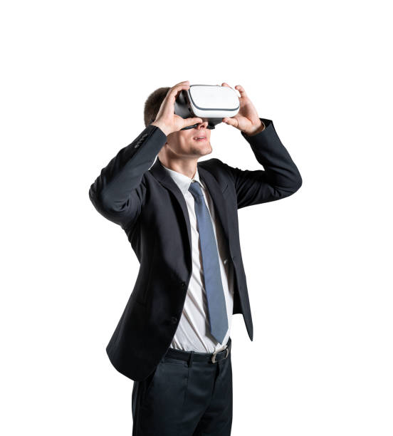 istock Young businessman in VR glasses, isolated 1310396934
