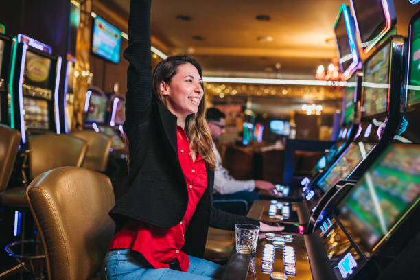 1,007 Woman In A Casino Winning At Slot Machine Stock Photos, Pictures &  Royalty-Free Images - iStock