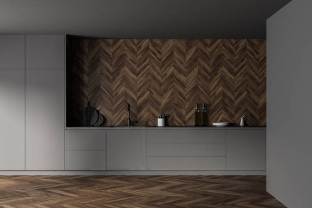 istock Gray and wooden kitchen interior with cupboards 1310399611