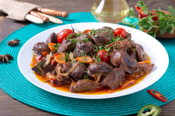istock Roast turkey liver with vegetables and herbs. Diet dish 1310400864