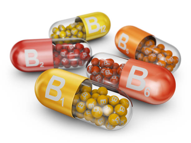 capsules avec vitamines b - pill vitamin b vitamin pill orange photos et images de collection