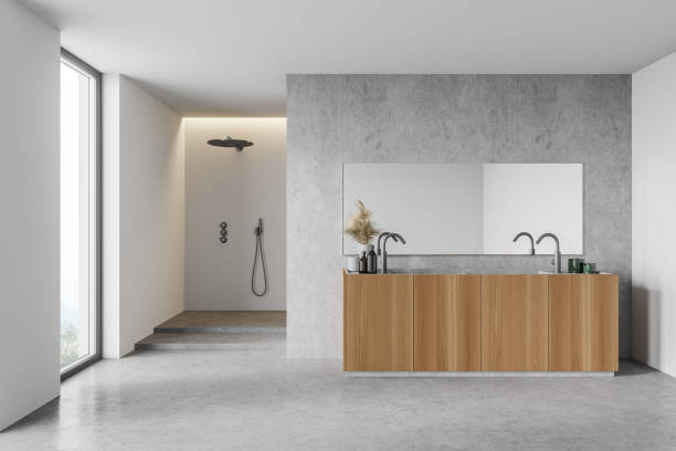 istock White and concrete bathroom interior with sink and shower 1310401754