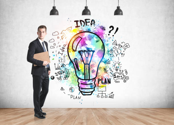 istock Man with clipboard and his business idea 1310402191
