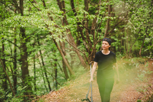 istock Woman Hiking In The Forest 1310402195