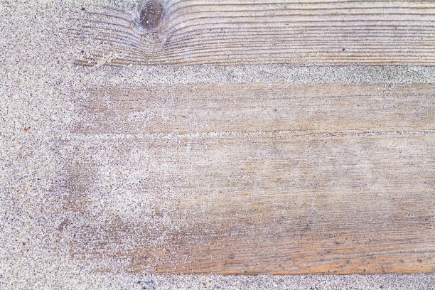 istock Wooden background. Wood, beach, sand. Board with sand. 1310403061