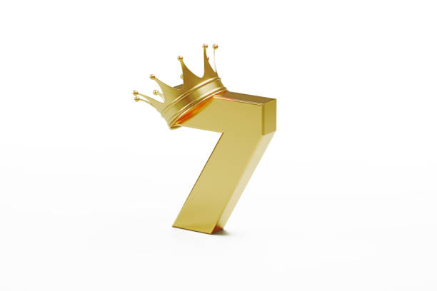 istock Number Seven Wearing Gold Crown Isolated On White Background 1310406581