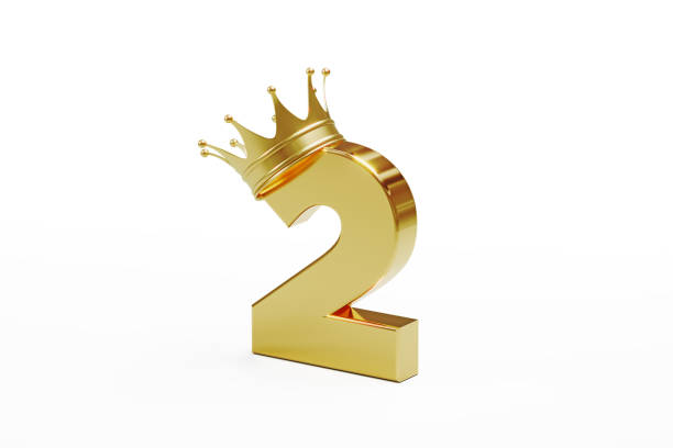 istock Number Two Wearing Gold Crown Isolated On White Background 1310406584