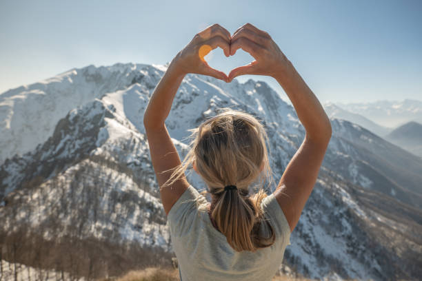 istock Hiker female on mountain top loving nature 1310407558