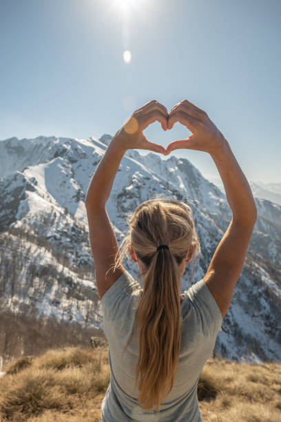 istock Hiker female on mountain top loving nature 1310407580