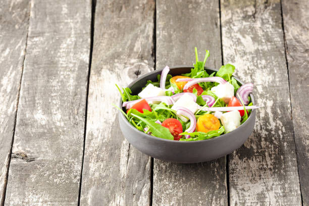 istock Green salad. Food background 1310410991